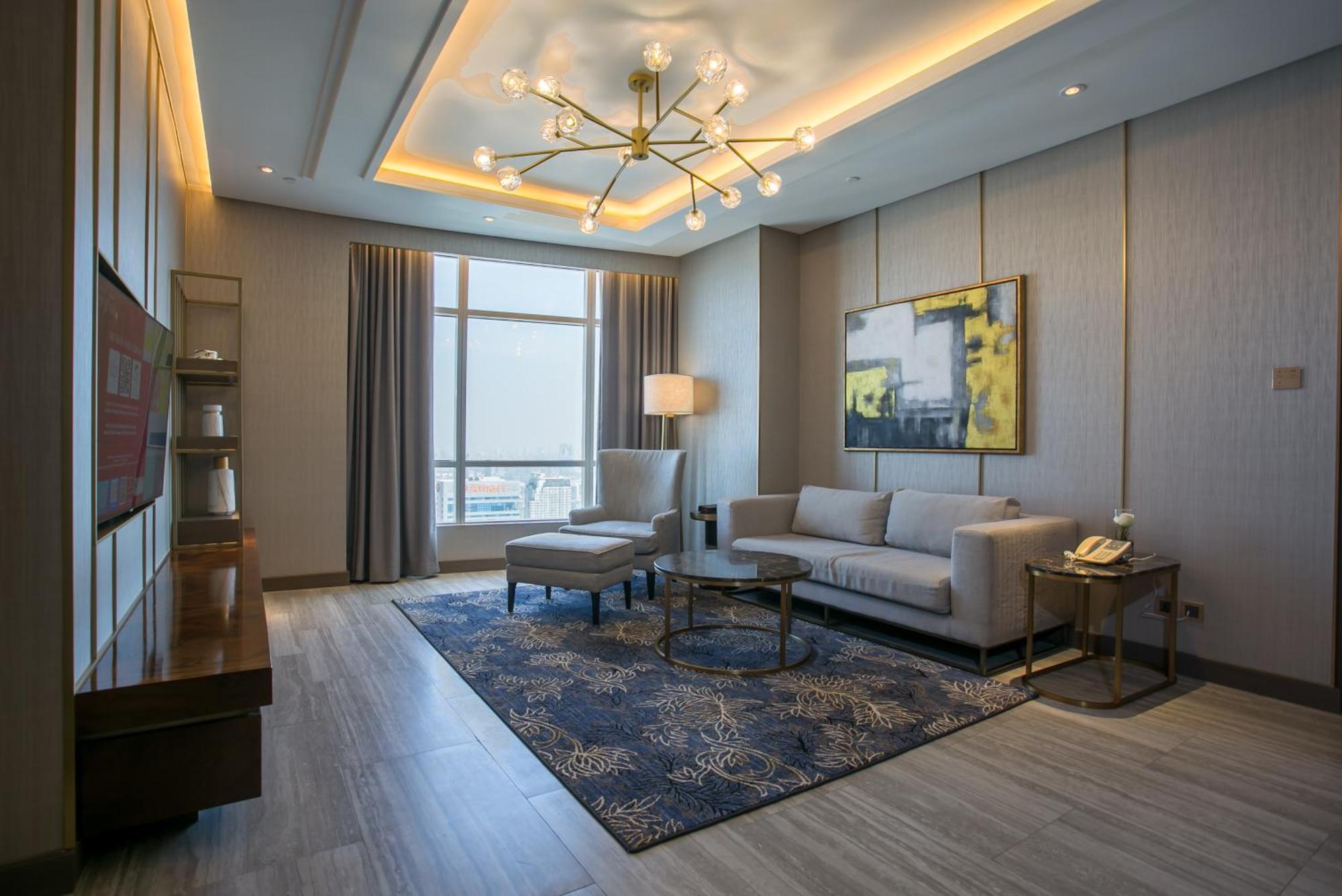 Centara Grand At Centralworld Bangkok Exterior foto A living room at the hotel